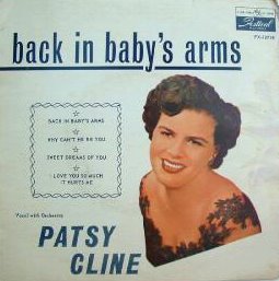 60IES AUSSIE EP BABY IN BABYS ARMS
